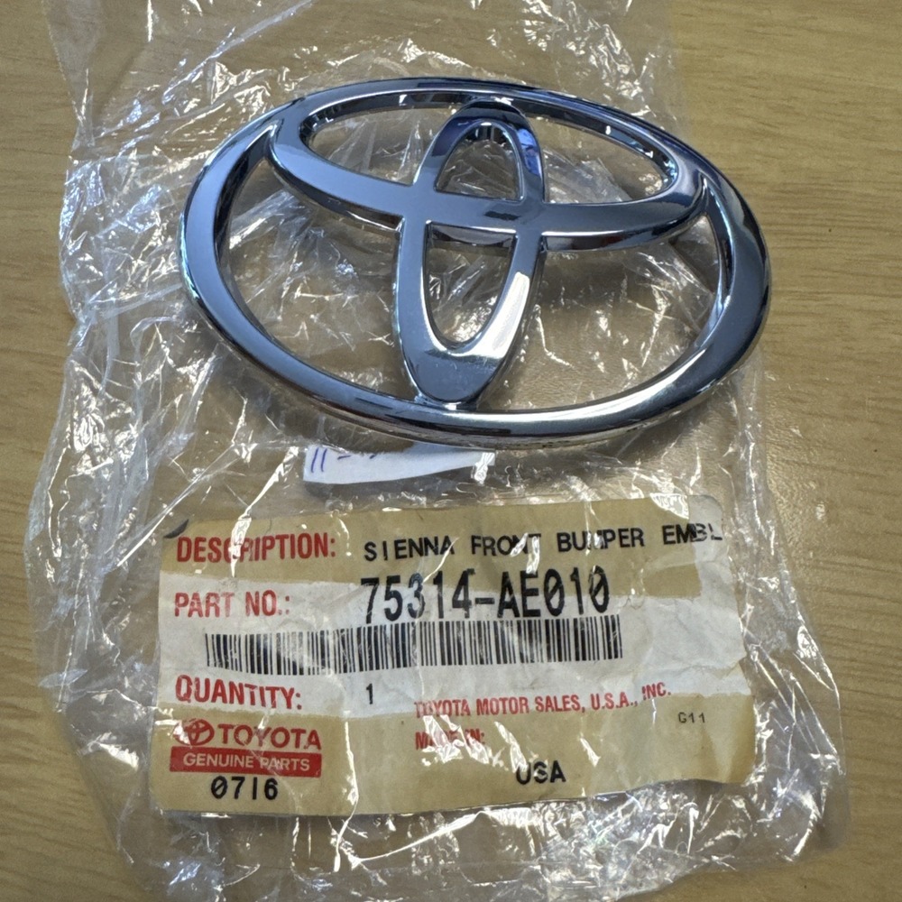 Toyota Sienna 2003-2005  Front Grill Emblem Genuine OEM    75314-AE010